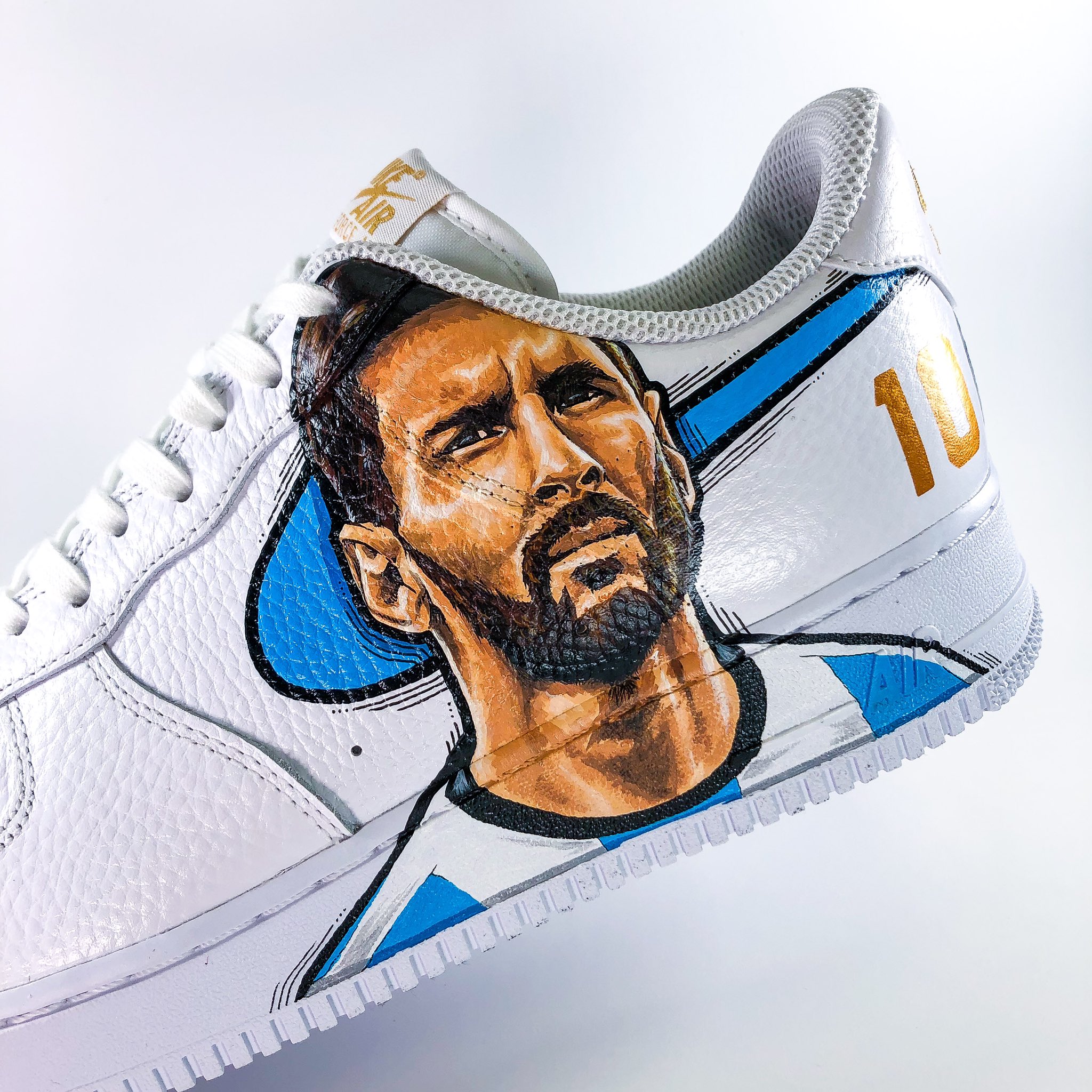 white sneakers with messi face